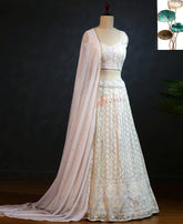 White Partywear Embroidered Work Georgette Lehenga Choli